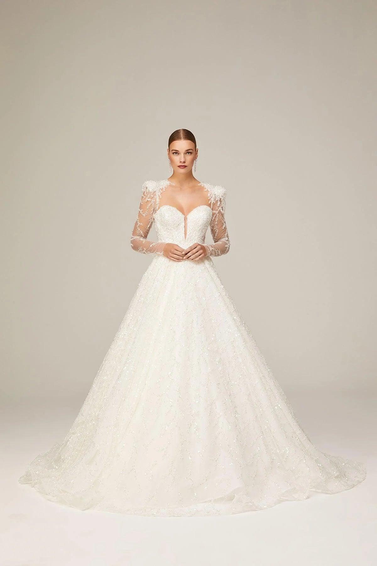 Balo Salonlarında Işıltıyla Parlayın: Kış Düğünlerine Özel Gelinlik Önerileri - Mediha Cambaz Bridal