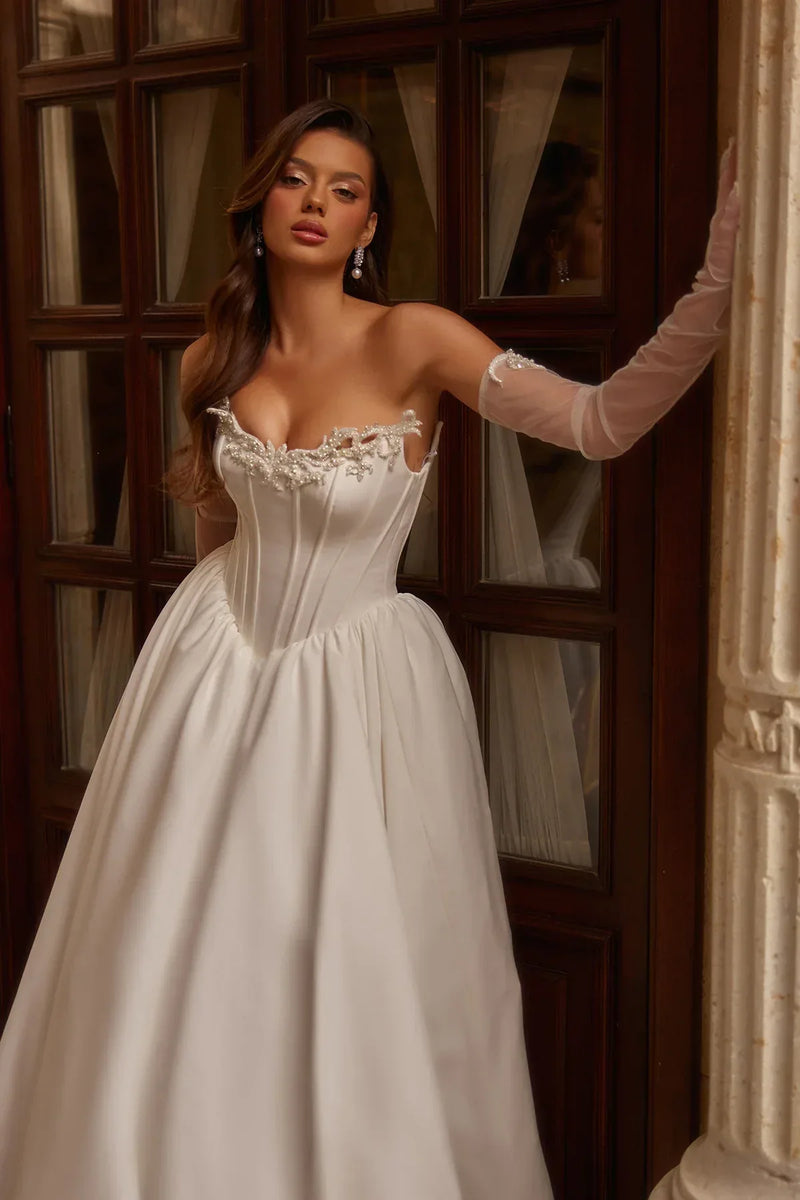 OFF WHITE / 34 Elorin Satin Glove-Style Wedding Dress with Handmade Pearl and Crystal Embellished Neckline and V-Neck. OFF WHITE / 34 Elorin Satin Glove-Style Wedding Dress with Handmade Pearl and Crystal Embellished Neckline and V-Neck.